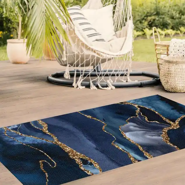 Abverkauf Goldene Glitzer Wellen vor Blau Vinylteppich